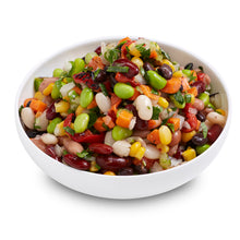 Load image into Gallery viewer, A bowl of bean medley salad consisting of a blend of beans, pulses, and vegetables with a vinaigrette dressing.