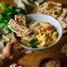 Load image into Gallery viewer, Bowl of Satay Chicken with rice and naan bread on a wooden table