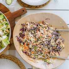 Load image into Gallery viewer, Japanese Slaw Salad with Sesame Mayo in a apricot bowl on a white table
