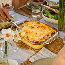 Load image into Gallery viewer, Potato Bake in glass tray getting served