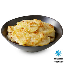 Load image into Gallery viewer, Bowl of cheesy potato bake with a freezer friendly label on a white background