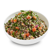 Load image into Gallery viewer, A bowl of Quinoa Tabbouleh Salad with tomatoes and herbs.