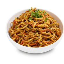 Load image into Gallery viewer, A bowl of Singapore Noodle Salad with visible ingredients including noodles, carrots, red capsicum, and sesame seeds.