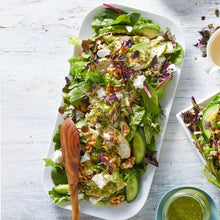 Load image into Gallery viewer, Pesto Chicken & Avocado Salad served on a white rectangle plate and a wooden serving spoon