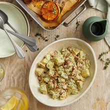 Load image into Gallery viewer, Potato Salad with Basil Mayonnaise & Almonds with cracked pepper in a white bowl
