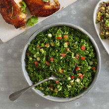 Load image into Gallery viewer, A bowl of Tabbouleh with a spoon