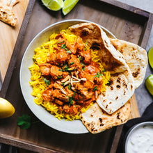 Load image into Gallery viewer, Butter chicken served with saffron basmati rice and naan bread in a bowl