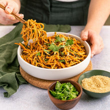 Load image into Gallery viewer, Singapore Noodle Salad in a round white bowl with chopsticks