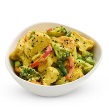 Load image into Gallery viewer, Bowl of vegetable curry with broccoli and bell peppers on a white background