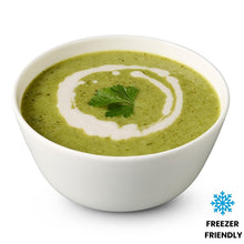 Load image into Gallery viewer, Green soup with a swirl of cream and a leaf on top, served in a white bowl, with 'Freezer Friendly' label.