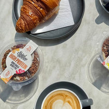 Load image into Gallery viewer, Salad servers high protein chia pot on table with coffee and croissant.