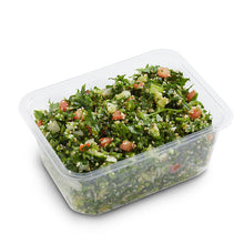 Load image into Gallery viewer, A plastic container of Tabbouleh Salad, consisting of chopped parsley, cucumber, tomatoes, and bulghur wheat, dressed in a lemon citrus dressing.