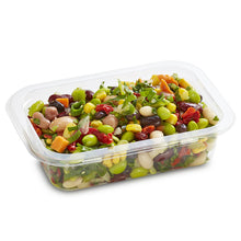Load image into Gallery viewer, A clear plastic container filled with a colourful bean medley salad, including a variety of beans, corn, edamame, and herbs, dressed with a lemon vinaigrette.