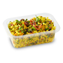 Load image into Gallery viewer, A clear plastic container filled with turmeric couscous salad featuring pieces of cauliflower, cranberries, roasted red capsicum, and herbs.