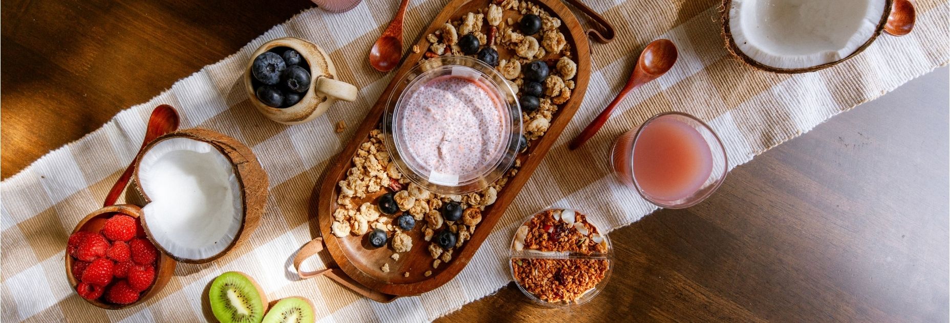 Salad Servers high protein chia pots in Choc Chia & Berry and Strawberry Oats & Chia, with toasted protein crunch