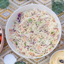 Load image into Gallery viewer, Japanese Slaw Salad with Sesame Mayo on patterned table cloth with green glasses
