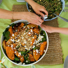 Load image into Gallery viewer, Pumpkin pinenut and feta salad in a white bowl
