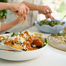 Load image into Gallery viewer, Pumpkin, Pinenut and Feta Salad having pine nuts sprinkled on it
